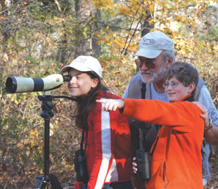 Family watching birds